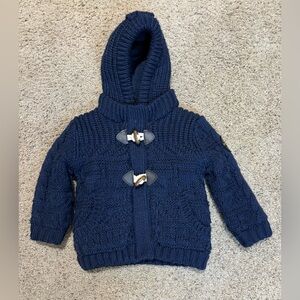 Zara Navy Knitted Sweater Jacket with zippered front and toggle buttons.
